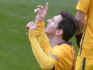 Pemain Barcelona, Lionel Messi merayakan golnya ke gawang Eibar pada laga pekan ke-28 La Liga Spanyol 2015-2016 di Stadion Municipal de Ipurua, Minggu (6/3/2016) malam WIB. (REUTERS/Vincent West)