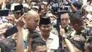 Calon presiden nomor urut 02 Prabowo Subianto tiba menghadiri pembekalan relawan Prabowo-Sandi di Padepokan Silat Taman Mini Indonesia Indah, Jakarta Timur, Jumat (15/3). (Liputan6.com/Immanuel Antonius)