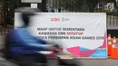 Spanduk penutupan terpampang di setiap pintu masuk kawasan Gelora Bung Karno, Jakarta, Jumat (20/7). Untuk memperlancar proses persiapan Asian Games 2018, kawasan GBK kembali ditutup untuk umum. (Liputan6.com/Helmi Fithriansyah)