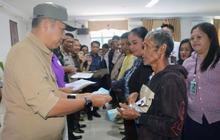 Pemkab Taput Salurkan Bantuan Jaminan Hidup Kemensos untuk Korban Bencana Hidrometeorologi