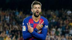 1. Gerard Pique (Barcelona) - Jebolan La Masia ini merupakan salah satu bek tengah terbaik dan masih menjadi andalan lini pertahanan Barcelona. Pique kembali ke Camp Nou setelah El Barca memboyongnya dari Manchester United dengan harga yang murah meriah yakni 5 juta euro. (AFP/Pau Barrena)