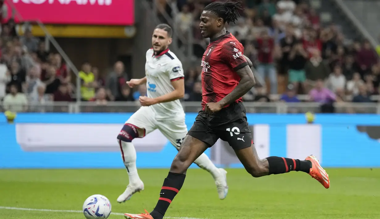 <p>Tiga poin ini membuat AC Milan kokoh di peringkat kedua dengan raihan 74 poin. (AP Photo/Antonio Calanni)</p>