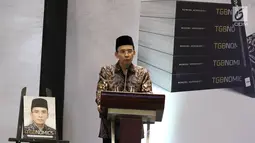 Gubernur NTB, TGB Muhammad Zainul Majdi memberi sambutan pada acara penggalangan dana untuk Lombok-Sumbawa di Jakarta, Jumat (14/9). Acara tersebut bersamaan dengan peluncuran buku TGBNomics. (Liputan6.com/Herman Zakharia)