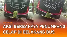 video aksi berbahaya seorang penumpang gelap bergelantungan di belakang bus viral di media sosial.