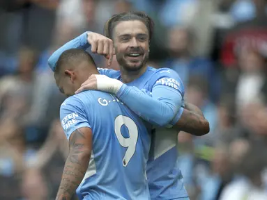 Manchester City langsung merespon hasil buruk di pekan pembuka Liga Inggris 2021/2022 dengan kemenangan besar 5-0 atas Norwich City pada pekan kedua, Sabtu (21/8/2021) di Etihad Stadium. Pemain anyar Jack Grealish mampu mencetak gol perdananya bagi The Citizens. (Foto: AFP/Adrian Dennis)