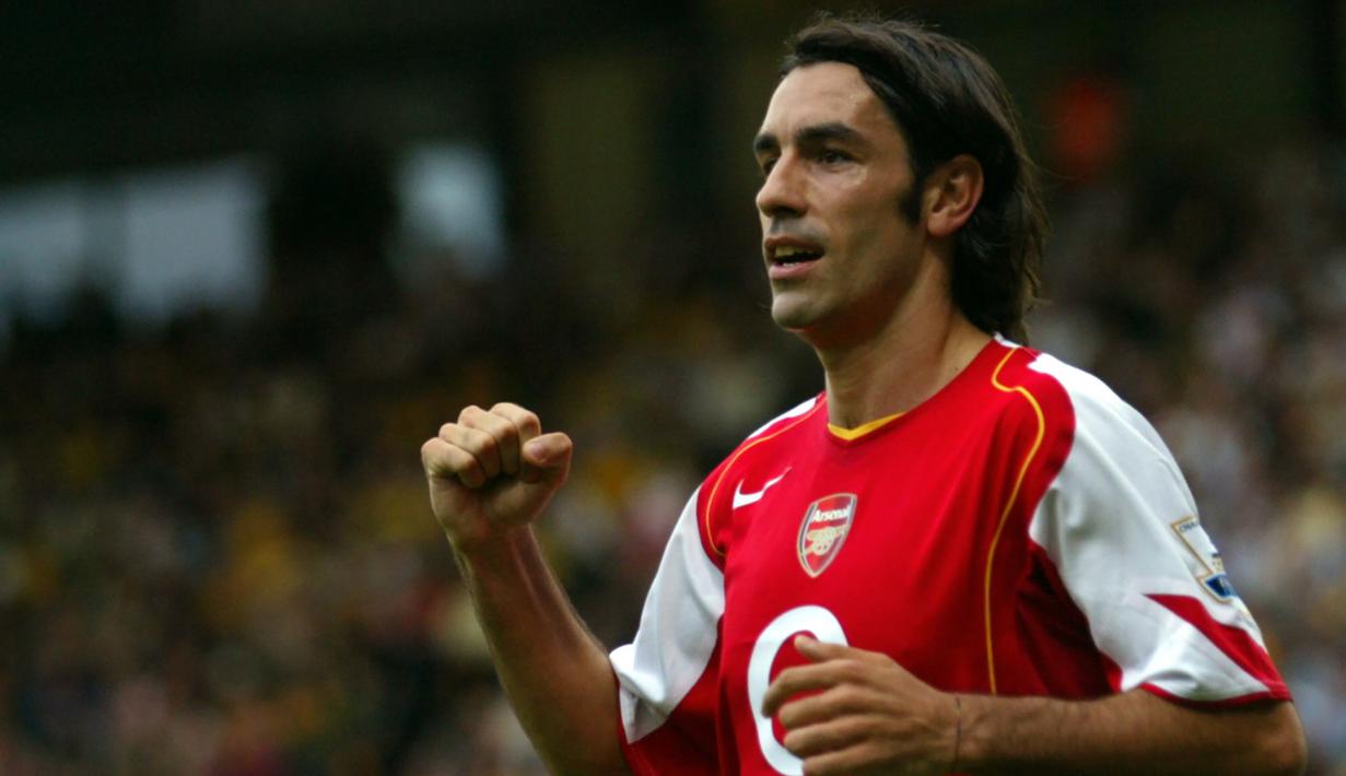 4. Robert Pires (Arsenal) - Robert Pires menikmati era kejayaannya bersama Arsenal pada tahun 2000-2006. Gelandang asal Prancis ini menyumbangkan dua gelar Liga Inggris dan dua Piala FA untuk Arsenal. (AFP/Carl De Souza)