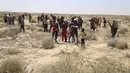 Jumlah migran Afrika sub-Sahara yang melakukan perjalanan ke Tunisia untuk menyeberangi Mediterania menuju Eropa telah meningkat. (AP Photo/Yousef Murad)