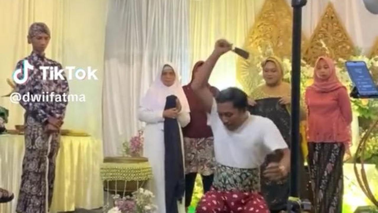 Momen Calon Ayah Terlalu Semangat saat Belah Kelapa di Acara 7 Bulanan Ini Viral, Bikin Ngakak