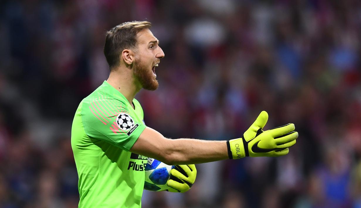 Namun harga membuat Arsenal harus segera memutar otak. Karena Oblak pasti tak akan dilepas dengan harga murah oleh Atletico Madrid. (AFP/Gabriel Bouys)