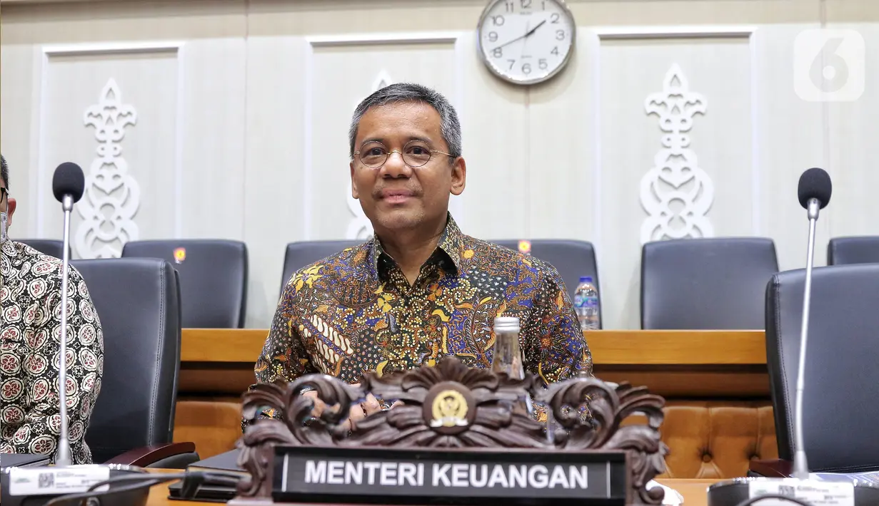 Wakil Menteri Keuangan (Wamenkeu) Suahasil Nazara mengikuti rapat kerja dengan Badan Legislasi DPR RI di kompleks Parlemen, Jakarta, Kamis (18/8/2022). Raker tersebut dalam rangka harmonisasi Rancangan Undang-Undang (RUU) tentang pengembangan dan penguatan sektor keuangan. (Liputan6.com/Angga Yuniar)