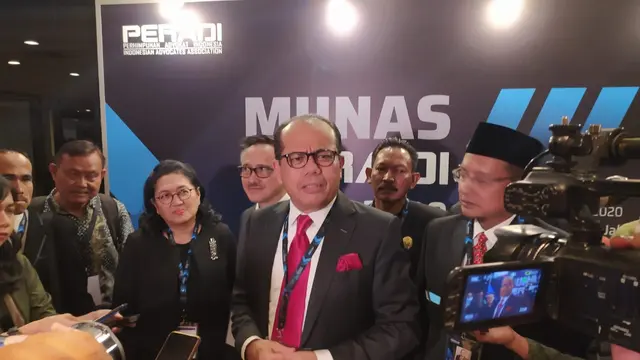 Juniver Girsang dalam Munas Peradi di Ancol, Jakarta Utara