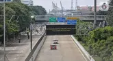 Kendaraan bermotor melintas di jalan Yos Sudarso menuju Pelabuhan Tanjung Priok, Jakarta, Jumat (18/3/2025). (Liputan6.com/Angga Yuniar)