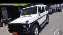 Mobil Jeep Putih petugas ini ikut mengawal Presiden Joko Widodo saat menuju di Hotel Whiz, Jakarta, Sabtu (23/8/2014)(Liputan6.com/Miftahul Hayat) 