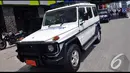 Mobil Jeep Putih petugas ini ikut mengawal Presiden Joko Widodo saat menuju di Hotel Whiz, Jakarta, Sabtu (23/8/2014)(Liputan6.com/Miftahul Hayat) 