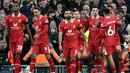 Para pemain Liverpool merayakan gol Curtis Jones saat Liverpool bertanding melawan Chelsea di pekan ke delapan Premier League 2024/2025 di Anfield, Minggu (20/10/2024) malam WIB. (Paul Ellis/AFP)