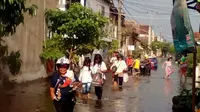 Banjir rob nyaris tanpa henti menggenangi dua desa di pesisir Demak. (Liputan6.com/Edhie Prayitno Ige)