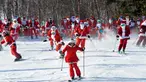 Para pemain ski berpakaian seperti Sinterklas meluncur selama berpartisipasi dalam acara tahunan Santa Sunday di Sunday River Resort yang terletak di Kota Newry, Amerika Serikat, Minggu (8/12/2019). Santa Sunday merupakan acara amal tahunan untuk River Fund Charity. (Joseph Prezioso / AFP)