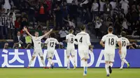 Pemain Real Madrid, Gareth Bale, merayakan gol yang dicetak ke gawang Kashima Antlers pada semifinal Piala Dunia Antarklub 2018, di Stadion Zayed Sports City, Kamis (20/12/2018) dini hari WIB.  (AP Photo/Hassan Ammar)