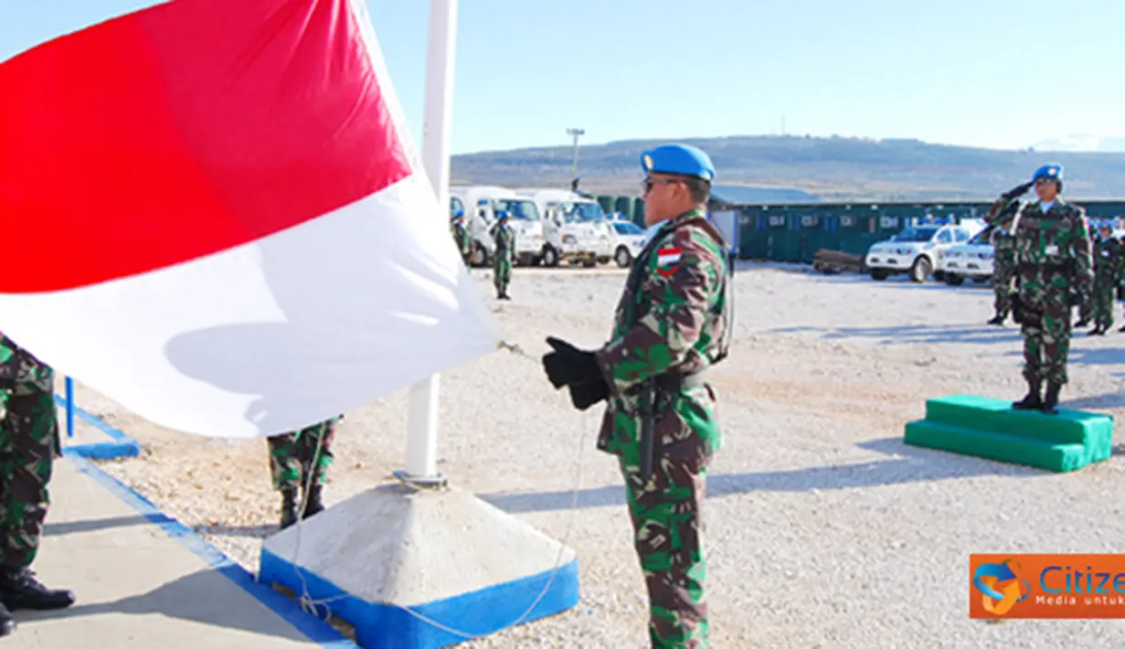 Citizen6, Lebanon Selatan: Upacara yang berlokasi di UN Posn 7-3, pada ketinggian 530 meter di atas permukaan laut, dengan suhu minus 7 derajat celcius, diawali dengan laporan Perwira Upacara Lettu Laut (PM) Anantyo Prahasto. (Pengirim: Badarudin Bakri)