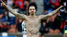 Pemain depan Swedia, Paris Saint-Germain, Zlatan Ibrahimovic merayakan kemenangan setelah mencetak gol pada pertandingan sepak bola Prancis L1 Paris Saint-Germain  vs Caen di stadion Parc des Prince, Paris (14/02/2015). (AFP PHOTO / KENZO TRIBOUILLARD)