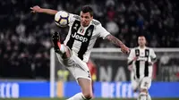 AC Milan berupaya mendatangkan Mario Mandzukic secara gratis pada bursa transfer Januari 2021. (AFP/Marco Bertorello)