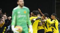 Para pemain Watford merayakan gol Joshua King ke gawang Manchester United dalam lanjutan Liga Inggris 2021/2022, Sabtu (20/11/2021) malam WIB di Stadion Vicarage Road. (AP Photo/Frank Augstein)