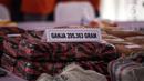 Barang bukti dihadirkan saat pemusnahan barang bukti narkotika di Jakarta, Rabu (24/8/2022). Sebanyak 8.742,2 gram sabu, 295.363 gram ganja, serta 29.083 butir pil ekstasi dimusnahkan dalam pemusnahan ini. (Liputan6.com/Faizal Fanani)