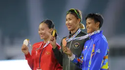 Ia mengungguli wakil Vietnam, Hoang Thanh Giang, yang meraih medali perak, serta atlet Filipina Sarah Dequinan yang harus puas membawa pulang medali perunggu. (Bola.com/Bagaskara Lazuardi)