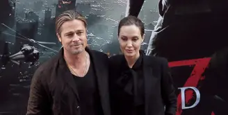 Belum lama ini Angelina Jolie dan Brad Pitt membawa kabar baik untuk para penggemarnya. Keduanya dikabarkan menghentikan proses cerai mereka dan akan kembali rujuk menjalin hubungan rumah tangganya. (AFP/Acques Demarthon)