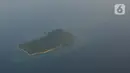 Salah satu pulau yang  terletak di kota Sorong, Papua Barat, Kamis (21/11/2019). Kota Sorong merupakan kota terbesar kedua di Papua, suasana kota Sorong sangat ramai dan memiliki beberapa pulau di kabupaten Sorong. (Liputan6.com/Herman Zakharia)