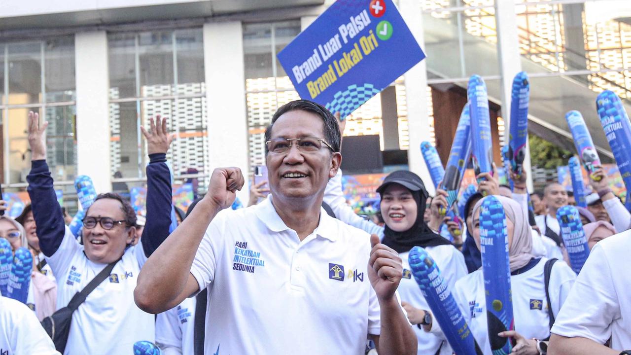 FOTO: Antuasia Warga Warga Ikuti Fun Walk Peringatan Hari Kekayaan Intelektual