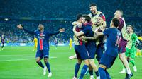 Pemain Paris Saint-Germain (PSG) melakukan selebrasi setelah menaklukkan Inter Milan pada laga final Liga champions 2024/2025 di Stadion Allianz Arena, Minggu (01/06/2025) dini hari WIB. (AP Photo/Martin Meissner)