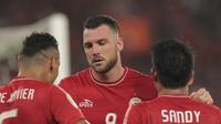 Pemain Persija Jakarta, Marko Simic saat melawan Johor Darul Ta’zim pada laga Piala AFC 2018 di Stadion Utama Gelora Bung Karno, Jakarta, Selasa (10/4/2018). Persija Jakarta menang 4-0.  (Bola.com/Nick Hanoatubun)