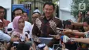 Komisaris Utama Pertamina Basuki Tjahaja Purnama memberikan keterangan usai menemui Presiden Joko Widodo di Istana, Jakarta, Senin (9/12/2019). Pertemuan tersebut Presiden meminta agar memperbaiki defisit neraca perdagangan kita di sektor petrokimia dan migas. (Liputan6.com/Angga Yuniar)