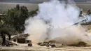 Ketika tenggat waktu enam jam berlalu agar warga Gaza utara ke selatan, pasukan militer Israel dilaporkan berkumpul di sekitar Gaza. Kendati demikian belum ada pergerakan signifikan lebih jauh. (Aris MESSINIS/AFP)