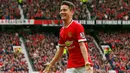 Gelandang Manchester United, Ander Herrera melakukan selebrasi usai mencetak gol ke gawang Arsenal saat Laga Liga Premier Inggris di Stadion Old Trafford, Minggu (17/5/2015). Manchester United bermain imbang 1-1 atas Arsenal. (Reuters/Jason Cairnduff)