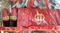 Replika produk Gucci untuk para mendiang (BBC)