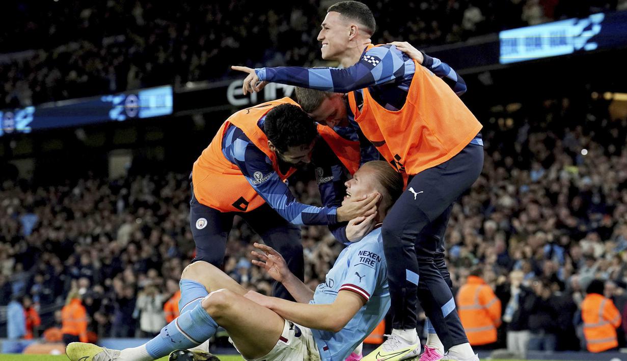 Erling Haaland menasbihkan diri sebagai penyerang dengan torehan gol terbanyak era Premier League. (Martin Rickett/PA via AP)