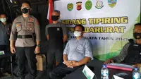 Seorang tukang bubur di Tasikmalaya didenda Rp 5 juta lantaran melanggar PPKM darurat. (Merdeka.com/Mochammad Iqbal)