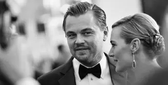Leonardo DiCaprio dan Kate Winslet memang memiliki kedekatan sejak lama. Terlebih saat keduanya bermain dalam satu judul film yang sama, yakni Titanic pada tahun 1997 silam. (AFP/Charley Gallay)