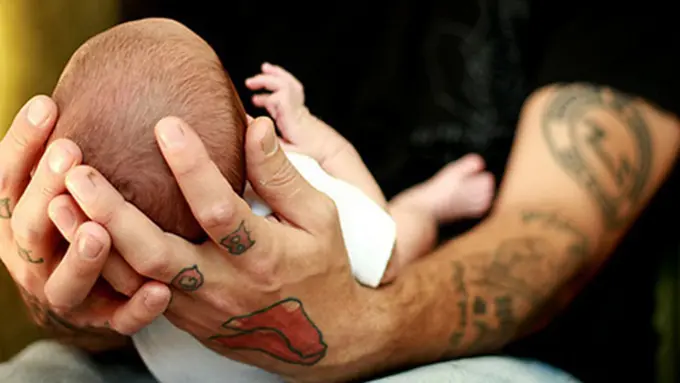 Photo: Copyright fyeahtattooedparents.tumblr.com