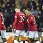 Diogo Dalot dari Manchester United, kedua kanan, merayakan bersama rekan satu timnya setelah mencetak gol pertama timnya pada pertandingan sepak bola putaran ketiga Piala FA Inggris antara Wigan Athletic dan Manchester United di Stadion DW, Wigan, Inggris, Senin, 8 Januari 2024. ( Foto AP/Jon Super)