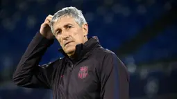 Gerardo Martino datang ke Camp Nou menjelang musim 2013/2014. Meski tampil apik di awal musim, Barcelona tiba-tiba melorot di paruh kedua musim hingga akhirnya gagal menyabet gelar Liga Spanyol dan tersingkir dari perempatfinal Liga Champions. (AFP/Filippo Monteforte)