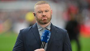 Mantan pemain Timnas Inggris, Wayne Rooney, bekerja untuk Channel 4 TV menjelang pertandingan persahabatan internasional antara Inggris dan Islandia di Stadion Wembley di London pada 7 Juni 2024. (Glyn KIRK/AFP)