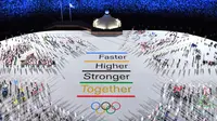 Gambaran menunjukkan delegasi atlet mengambil bagian dalam upacara pembukaan Olimpiade Tokyo 2020, di Olympic Stadium, di Tokyo, Jumat (23/7/2021). Upacara pembukaan Olimpiade Tokyo yang berlangsung dalam era pandemi digelar tanpa penonton. (François-Xavier MARIT / AFP)