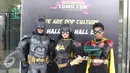 Cosplay Batman, Robin dan Cat women berpose  saat acara Indonesia Comic Con 2016 di Jakarta, Sabtu (1/10). Indonesia Comic Con 2016 bertema "We Are Pop Culture" ini digelar di Hall A dan B, JCC Senayan. (Liputan6.com/Herman Zakharia)