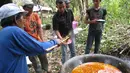 Di Aceh ada tradisi Meugang. Tradisi itu berupa memasak daging yang kemudian dibagikan kepada kaum dhuafa serta dimakan bersama-sema keluarga saat lebaran tiba. (Istimewa) 