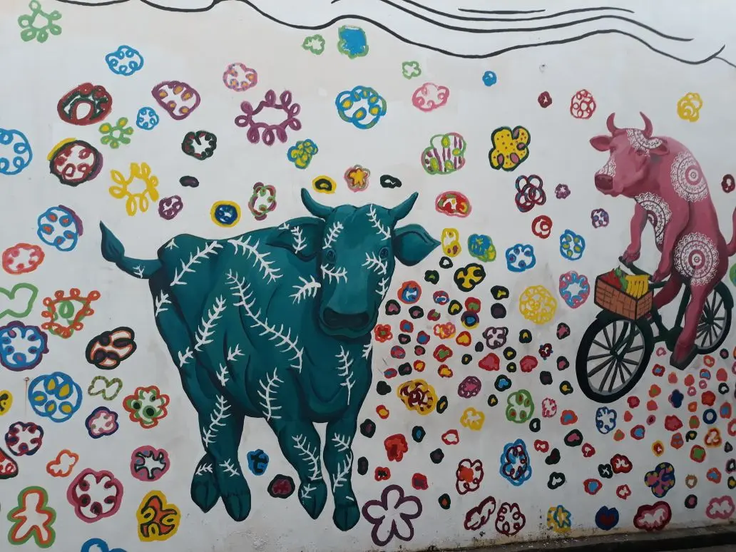 Mural sapi di kawasan Little India.