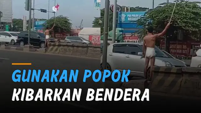 Beredar video seorang pria berdiri kibarkan bendera Indonesia hanya menggunakan popok di depan Mega Bekasi Hypermall.