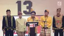 Ketua Umum Partai Hanura Oesman Sapta Odang (OSO) memberi sambutan dalam pembukaan Rakernas Hanura di Pekanbaru, Riau, Selasa (8/5). Dalam sambutannya, OSO menyampaikan bahwa Presiden Jokowi batal menghadiri acara tersebut. (Liputan6.com/Herman Zakharia)